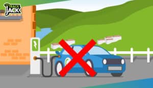 Elektrische auto bij een laadpaal met een rood kruis erdoor