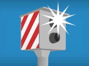 Flitspaal langs de weg in Nederland controleert snelheid van automobilisten